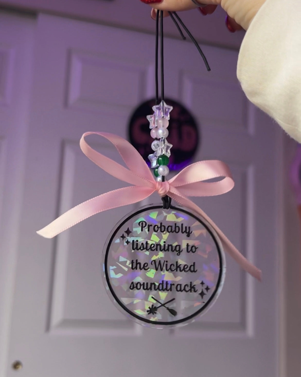 defying-car charm